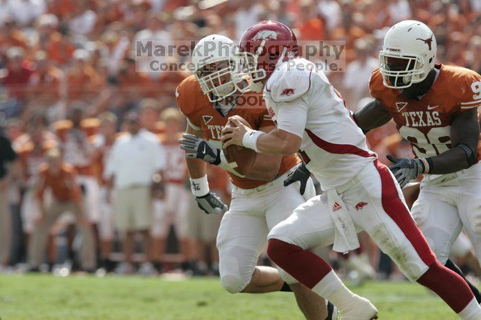 The University of Texas football team defeated the Arkansas Razorbacks with a score of 52-10 in Austin, TX on Saturday, September 27, 2008.

Filename: SRM_20080927_15440410.jpg
Aperture: f/5.6
Shutter Speed: 1/1250
Body: Canon EOS-1D Mark II
Lens: Canon EF 300mm f/2.8 L IS