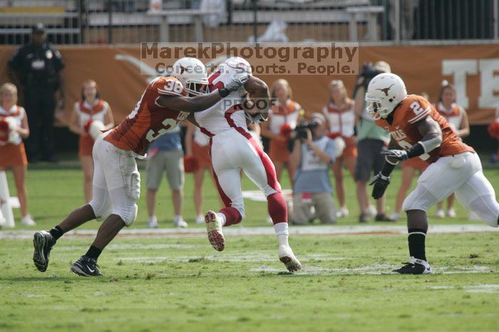 The University of Texas football team defeated the Arkansas Razorbacks with a score of 52-10 in Austin, TX on Saturday, September 27, 2008.

Filename: SRM_20080927_15465875.jpg
Aperture: f/5.6
Shutter Speed: 1/1250
Body: Canon EOS-1D Mark II
Lens: Canon EF 300mm f/2.8 L IS