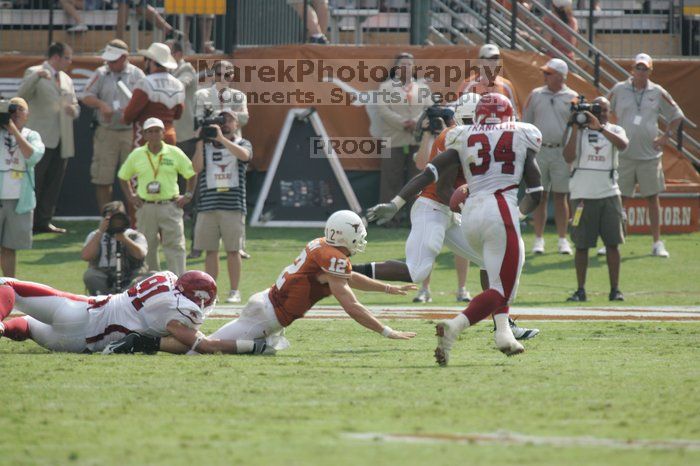 The University of Texas football team defeated the Arkansas Razorbacks with a score of 52-10 in Austin, TX on Saturday, September 27, 2008.

Filename: SRM_20080927_15515097.jpg
Aperture: f/5.6
Shutter Speed: 1/1000
Body: Canon EOS-1D Mark II
Lens: Canon EF 300mm f/2.8 L IS