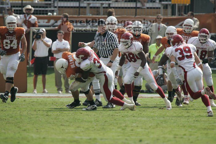 The University of Texas football team defeated the Arkansas Razorbacks with a score of 52-10 in Austin, TX on Saturday, September 27, 2008.

Filename: SRM_20080927_15531612.jpg
Aperture: f/5.6
Shutter Speed: 1/1250
Body: Canon EOS-1D Mark II
Lens: Canon EF 300mm f/2.8 L IS