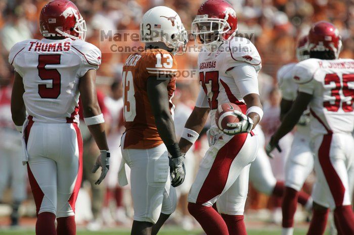 The University of Texas football team defeated the Arkansas Razorbacks with a score of 52-10 in Austin, TX on Saturday, September 27, 2008.

Filename: SRM_20080927_15551621.jpg
Aperture: f/5.6
Shutter Speed: 1/1600
Body: Canon EOS-1D Mark II
Lens: Canon EF 300mm f/2.8 L IS