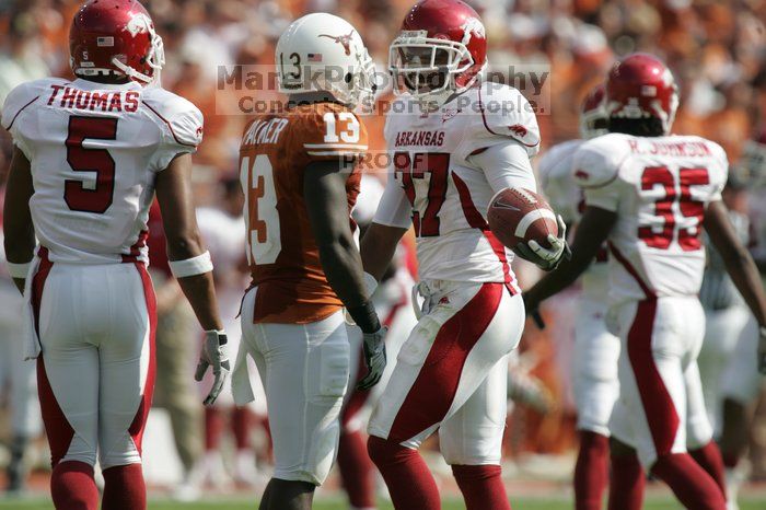 The University of Texas football team defeated the Arkansas Razorbacks with a score of 52-10 in Austin, TX on Saturday, September 27, 2008.

Filename: SRM_20080927_15551622.jpg
Aperture: f/5.6
Shutter Speed: 1/1600
Body: Canon EOS-1D Mark II
Lens: Canon EF 300mm f/2.8 L IS