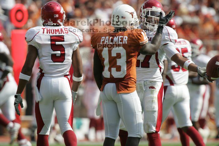 The University of Texas football team defeated the Arkansas Razorbacks with a score of 52-10 in Austin, TX on Saturday, September 27, 2008.

Filename: SRM_20080927_15551824.jpg
Aperture: f/5.6
Shutter Speed: 1/1600
Body: Canon EOS-1D Mark II
Lens: Canon EF 300mm f/2.8 L IS