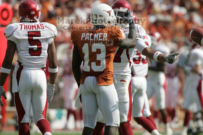 The University of Texas football team defeated the Arkansas Razorbacks with a score of 52-10 in Austin, TX on Saturday, September 27, 2008.

Filename: SRM_20080927_15551825.jpg
Aperture: f/5.6
Shutter Speed: 1/1600
Body: Canon EOS-1D Mark II
Lens: Canon EF 300mm f/2.8 L IS