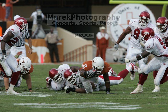 The University of Texas football team defeated the Arkansas Razorbacks with a score of 52-10 in Austin, TX on Saturday, September 27, 2008.

Filename: SRM_20080927_16431069.jpg
Aperture: f/5.6
Shutter Speed: 1/1000
Body: Canon EOS-1D Mark II
Lens: Canon EF 300mm f/2.8 L IS