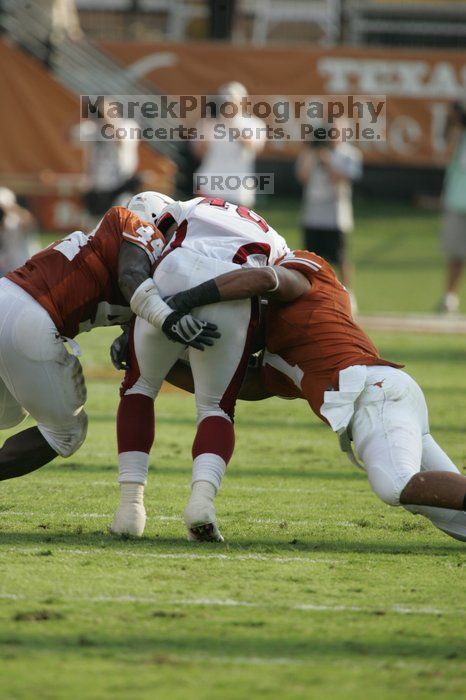 The University of Texas football team defeated the Arkansas Razorbacks with a score of 52-10 in Austin, TX on Saturday, September 27, 2008.

Filename: SRM_20080927_17042618.jpg
Aperture: f/5.6
Shutter Speed: 1/1250
Body: Canon EOS-1D Mark II
Lens: Canon EF 300mm f/2.8 L IS