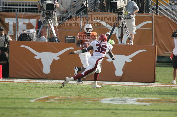 The University of Texas football team defeated the Arkansas Razorbacks with a score of 52-10 in Austin, TX on Saturday, September 27, 2008.

Filename: SRM_20080927_17072432.jpg
Aperture: f/5.6
Shutter Speed: 1/1250
Body: Canon EOS-1D Mark II
Lens: Canon EF 300mm f/2.8 L IS