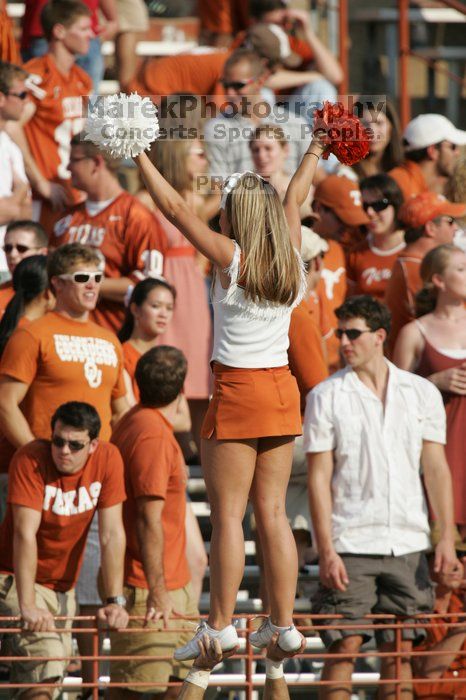 Texas Cheerleaders.  The University of Texas football team defeated the Arkansas Razorbacks with a score of 52-10 in Austin, TX on Saturday, September 27, 2008.

Filename: SRM_20080927_17131610.jpg
Aperture: f/5.6
Shutter Speed: 1/2500
Body: Canon EOS-1D Mark II
Lens: Canon EF 300mm f/2.8 L IS