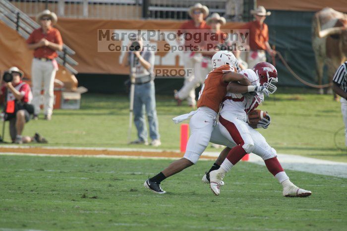 The University of Texas football team defeated the Arkansas Razorbacks with a score of 52-10 in Austin, TX on Saturday, September 27, 2008.

Filename: SRM_20080927_17133017.jpg
Aperture: f/5.6
Shutter Speed: 1/800
Body: Canon EOS-1D Mark II
Lens: Canon EF 300mm f/2.8 L IS