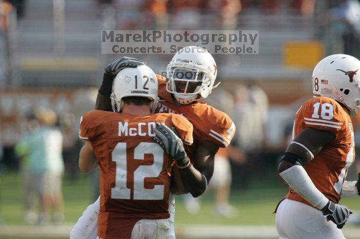 The University of Texas football team defeated the Arkansas Razorbacks with a score of 52-10 in Austin, TX on Saturday, September 27, 2008.

Filename: SRM_20080927_17165092.jpg
Aperture: f/5.6
Shutter Speed: 1/800
Body: Canon EOS-1D Mark II
Lens: Canon EF 300mm f/2.8 L IS