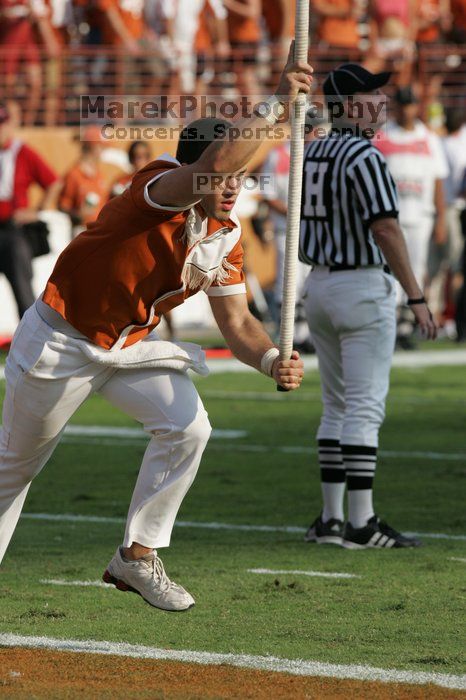 Texas Cheerleaders.  The University of Texas football team defeated the Arkansas Razorbacks with a score of 52-10 in Austin, TX on Saturday, September 27, 2008.

Filename: SRM_20080927_17182002.jpg
Aperture: f/5.6
Shutter Speed: 1/2000
Body: Canon EOS-1D Mark II
Lens: Canon EF 300mm f/2.8 L IS