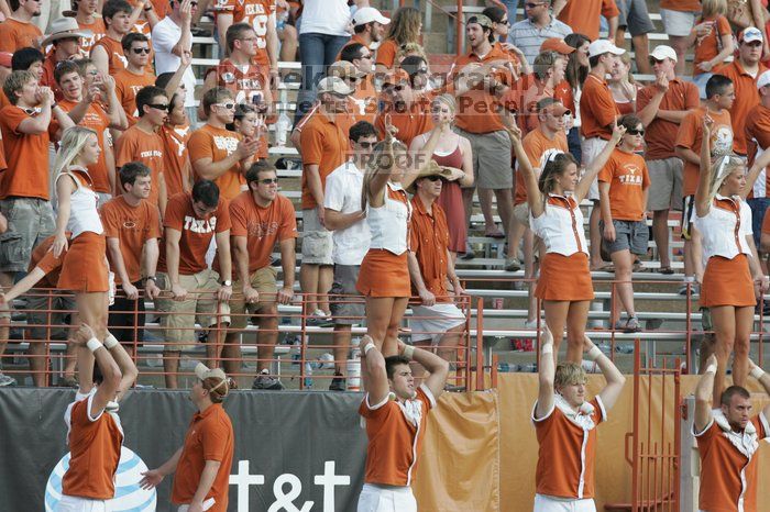 Texas Cheerleaders.  The University of Texas football team defeated the Arkansas Razorbacks with a score of 52-10 in Austin, TX on Saturday, September 27, 2008.

Filename: SRM_20080927_17212437.jpg
Aperture: f/5.6
Shutter Speed: 1/640
Body: Canon EOS-1D Mark II
Lens: Canon EF 300mm f/2.8 L IS