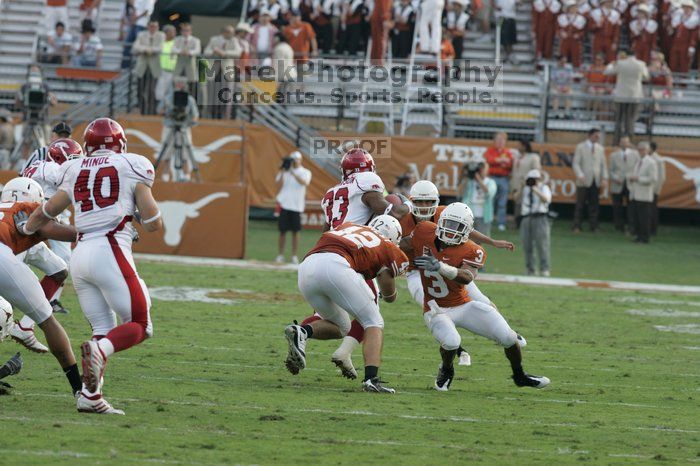 The University of Texas football team defeated the Arkansas Razorbacks with a score of 52-10 in Austin, TX on Saturday, September 27, 2008.

Filename: SRM_20080927_17214650.jpg
Aperture: f/5.6
Shutter Speed: 1/640
Body: Canon EOS-1D Mark II
Lens: Canon EF 300mm f/2.8 L IS