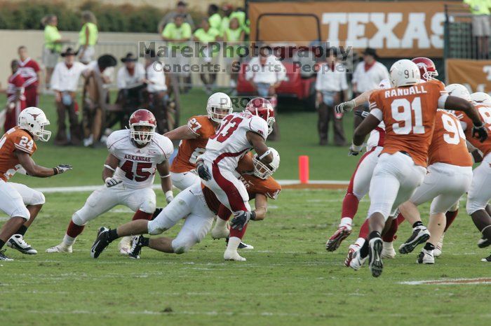 The University of Texas football team defeated the Arkansas Razorbacks with a score of 52-10 in Austin, TX on Saturday, September 27, 2008.

Filename: SRM_20080927_17230461.jpg
Aperture: f/5.6
Shutter Speed: 1/640
Body: Canon EOS-1D Mark II
Lens: Canon EF 300mm f/2.8 L IS