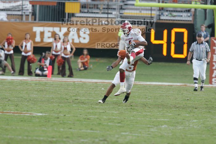 The University of Texas football team defeated the Arkansas Razorbacks with a score of 52-10 in Austin, TX on Saturday, September 27, 2008.

Filename: SRM_20080927_17253670.jpg
Aperture: f/5.0
Shutter Speed: 1/640
Body: Canon EOS-1D Mark II
Lens: Canon EF 300mm f/2.8 L IS