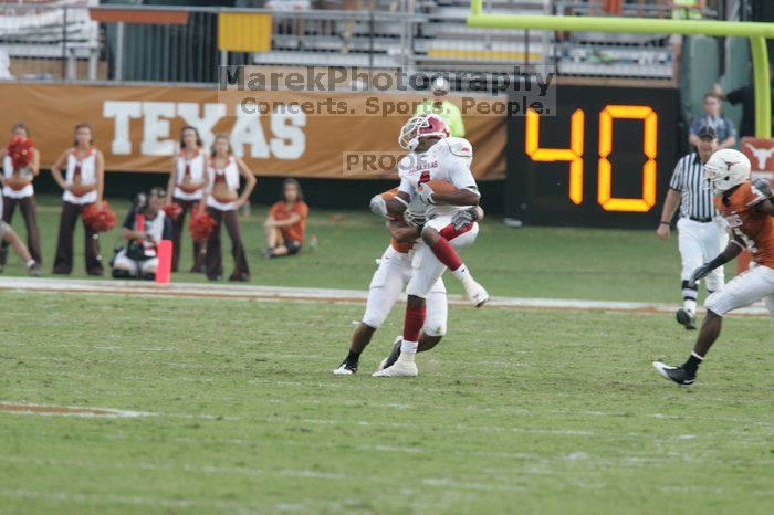 The University of Texas football team defeated the Arkansas Razorbacks with a score of 52-10 in Austin, TX on Saturday, September 27, 2008.

Filename: SRM_20080927_17253871.jpg
Aperture: f/5.0
Shutter Speed: 1/640
Body: Canon EOS-1D Mark II
Lens: Canon EF 300mm f/2.8 L IS