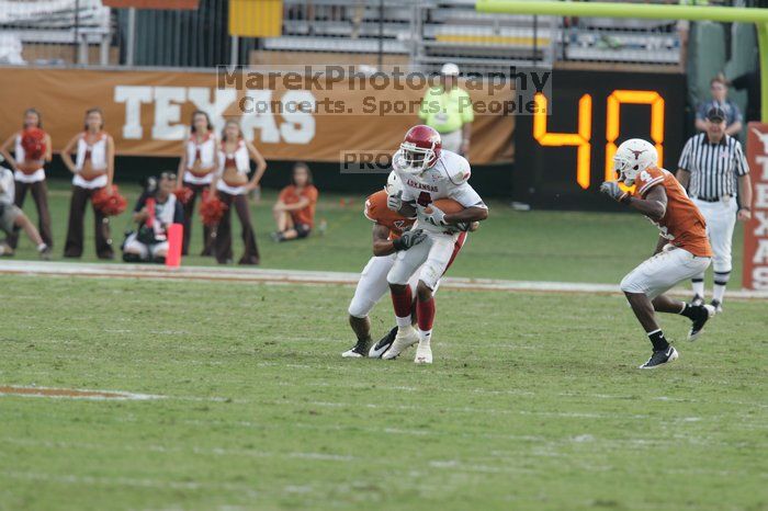 The University of Texas football team defeated the Arkansas Razorbacks with a score of 52-10 in Austin, TX on Saturday, September 27, 2008.

Filename: SRM_20080927_17253872.jpg
Aperture: f/5.0
Shutter Speed: 1/640
Body: Canon EOS-1D Mark II
Lens: Canon EF 300mm f/2.8 L IS