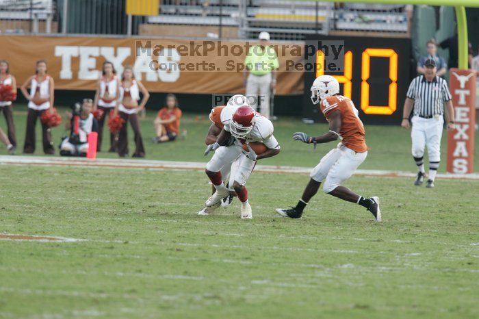 The University of Texas football team defeated the Arkansas Razorbacks with a score of 52-10 in Austin, TX on Saturday, September 27, 2008.

Filename: SRM_20080927_17253873.jpg
Aperture: f/5.0
Shutter Speed: 1/640
Body: Canon EOS-1D Mark II
Lens: Canon EF 300mm f/2.8 L IS