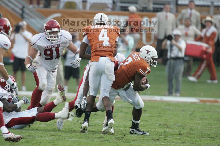 The University of Texas football team defeated the Arkansas Razorbacks with a score of 52-10 in Austin, TX on Saturday, September 27, 2008.

Filename: SRM_20080927_17300204.jpg
Aperture: f/5.6
Shutter Speed: 1/640
Body: Canon EOS-1D Mark II
Lens: Canon EF 300mm f/2.8 L IS