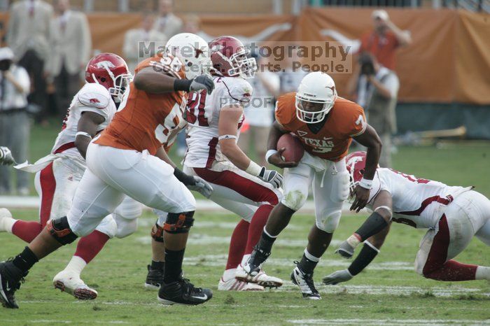 The University of Texas football team defeated the Arkansas Razorbacks with a score of 52-10 in Austin, TX on Saturday, September 27, 2008.

Filename: SRM_20080927_17310619.jpg
Aperture: f/5.6
Shutter Speed: 1/500
Body: Canon EOS-1D Mark II
Lens: Canon EF 300mm f/2.8 L IS