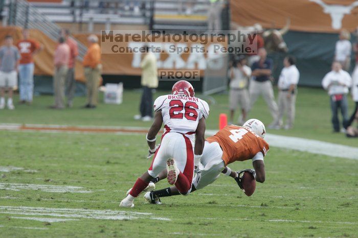 The University of Texas football team defeated the Arkansas Razorbacks with a score of 52-10 in Austin, TX on Saturday, September 27, 2008.

Filename: SRM_20080927_17321426.jpg
Aperture: f/5.0
Shutter Speed: 1/800
Body: Canon EOS-1D Mark II
Lens: Canon EF 300mm f/2.8 L IS