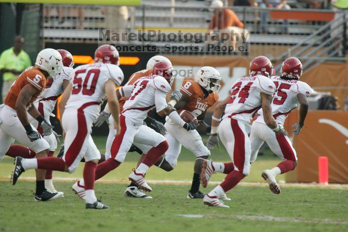 The University of Texas football team defeated the Arkansas Razorbacks with a score of 52-10 in Austin, TX on Saturday, September 27, 2008.

Filename: SRM_20080927_17382483.jpg
Aperture: f/5.6
Shutter Speed: 1/800
Body: Canon EOS-1D Mark II
Lens: Canon EF 300mm f/2.8 L IS