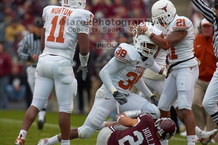 The University of Texas, Austin played Texas A&M in football at Kyle Field, College Station, on November 23, 2007.  UT lost to the Aggies, 30 to 38.

Filename: SRM_20071123_1639261.jpg
Aperture: f/5.6
Shutter Speed: 1/1250
Body: Canon EOS-1D Mark II
Lens: Canon EF 300mm f/2.8 L IS