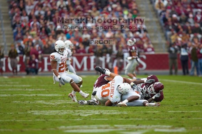 The University of Texas, Austin played Texas A&M in football at Kyle Field, College Station, on November 23, 2007.  UT lost to the Aggies, 30 to 38.

Filename: SRM_20071123_1655227.jpg
Aperture: f/2.8
Shutter Speed: 1/1250
Body: Canon EOS-1D Mark II
Lens: Canon EF 300mm f/2.8 L IS