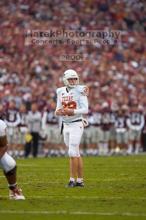 The University of Texas, Austin played Texas A&M in football at Kyle Field, College Station, on November 23, 2007.  UT lost to the Aggies, 30 to 38.

Filename: SRM_20071123_1714164.jpg
Aperture: f/2.8
Shutter Speed: 1/1000
Body: Canon EOS-1D Mark II
Lens: Canon EF 300mm f/2.8 L IS