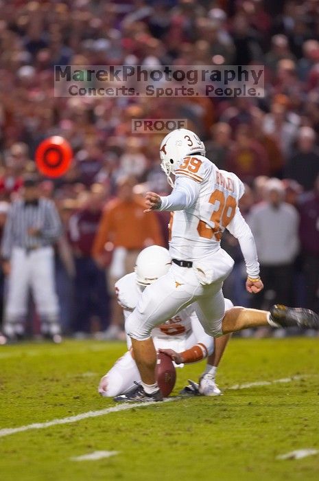 The University of Texas, Austin played Texas A&M in football at Kyle Field, College Station, on November 23, 2007.  UT lost to the Aggies, 30 to 38.

Filename: SRM_20071123_1822340.jpg
Aperture: f/2.8
Shutter Speed: 1/500
Body: Canon EOS-1D Mark II
Lens: Canon EF 300mm f/2.8 L IS