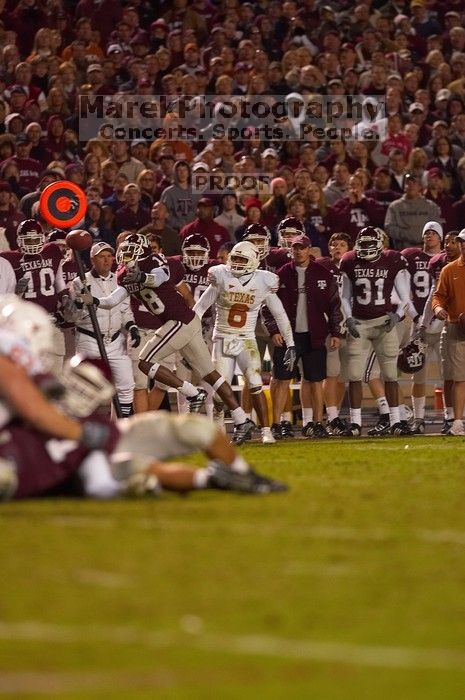 The University of Texas, Austin played Texas A&M in football at Kyle Field, College Station, on November 23, 2007.  UT lost to the Aggies, 30 to 38.

Filename: SRM_20071123_1909542.jpg
Aperture: f/2.8
Shutter Speed: 1/500
Body: Canon EOS-1D Mark II
Lens: Canon EF 300mm f/2.8 L IS