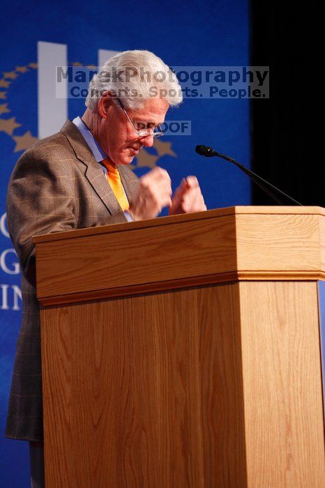 Former President Bill Clinton speaking at the CGIU meeting.  Day one of the 2nd Annual Clinton Global Initiative University (CGIU) meeting was held at The University of Texas at Austin, Friday, February 13, 2009.

Filename: SRM_20090213_16150404.jpg
Aperture: f/4.0
Shutter Speed: 1/60
Body: Canon EOS-1D Mark II
Lens: Canon EF 80-200mm f/2.8 L