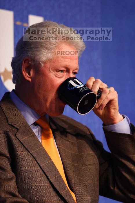 Former President Bill Clinton listens to UT President William Powers Jr. speak at the opening plenary session of the CGIU meeting.  Day one of the 2nd Annual Clinton Global Initiative University (CGIU) meeting was held at The University of Texas at Austin, Friday, February 13, 2009.

Filename: SRM_20090213_16304030.jpg
Aperture: f/2.8
Shutter Speed: 1/250
Body: Canon EOS 20D
Lens: Canon EF 300mm f/2.8 L IS