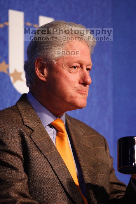 Former President Bill Clinton listens to UT President William Powers Jr. speak at the opening plenary session of the CGIU meeting.  Day one of the 2nd Annual Clinton Global Initiative University (CGIU) meeting was held at The University of Texas at Austin, Friday, February 13, 2009.

Filename: SRM_20090213_16304132.jpg
Aperture: f/2.8
Shutter Speed: 1/250
Body: Canon EOS 20D
Lens: Canon EF 300mm f/2.8 L IS