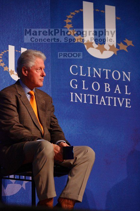 Former President Bill Clinton listens to UT President William Powers Jr. speak at the opening plenary session of the CGIU meeting.  Day one of the 2nd Annual Clinton Global Initiative University (CGIU) meeting was held at The University of Texas at Austin, Friday, February 13, 2009.

Filename: SRM_20090213_16331684.jpg
Aperture: f/4.0
Shutter Speed: 1/200
Body: Canon EOS-1D Mark II
Lens: Canon EF 80-200mm f/2.8 L