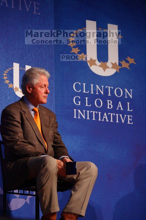 Former President Bill Clinton listens to UT President William Powers Jr. speak at the opening plenary session of the CGIU meeting.  Day one of the 2nd Annual Clinton Global Initiative University (CGIU) meeting was held at The University of Texas at Austin, Friday, February 13, 2009.

Filename: SRM_20090213_16332286.jpg
Aperture: f/4.0
Shutter Speed: 1/200
Body: Canon EOS-1D Mark II
Lens: Canon EF 80-200mm f/2.8 L