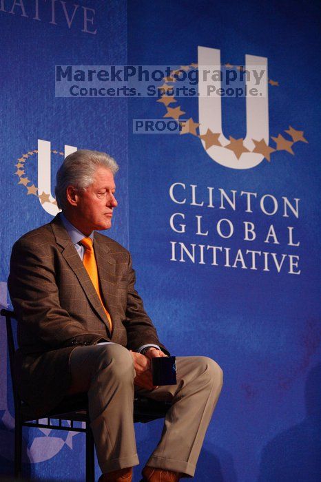 Former President Bill Clinton listens to UT President William Powers Jr. speak at the opening plenary session of the CGIU meeting.  Day one of the 2nd Annual Clinton Global Initiative University (CGIU) meeting was held at The University of Texas at Austin, Friday, February 13, 2009.

Filename: SRM_20090213_16332287.jpg
Aperture: f/4.0
Shutter Speed: 1/200
Body: Canon EOS-1D Mark II
Lens: Canon EF 80-200mm f/2.8 L