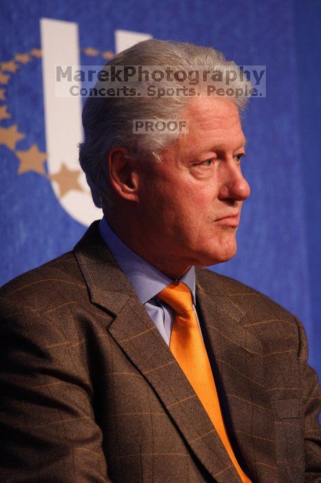 Former President Bill Clinton listens to UT President William Powers Jr. speak at the opening plenary session of the CGIU meeting.  Day one of the 2nd Annual Clinton Global Initiative University (CGIU) meeting was held at The University of Texas at Austin, Friday, February 13, 2009.

Filename: SRM_20090213_16351557.jpg
Aperture: f/2.8
Shutter Speed: 1/320
Body: Canon EOS 20D
Lens: Canon EF 300mm f/2.8 L IS