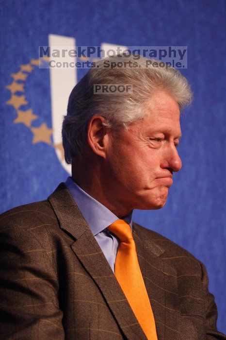 Former President Bill Clinton listens to UT President William Powers Jr. speak at the opening plenary session of the CGIU meeting.  Day one of the 2nd Annual Clinton Global Initiative University (CGIU) meeting was held at The University of Texas at Austin, Friday, February 13, 2009.

Filename: SRM_20090213_16351858.jpg
Aperture: f/2.8
Shutter Speed: 1/320
Body: Canon EOS 20D
Lens: Canon EF 300mm f/2.8 L IS