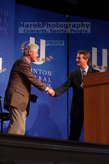 Former President Bill Clinton shakes hands with UT President William Powers Jr. after he spoke at the opening plenary session of the CGIU meeting.  Day one of the 2nd Annual Clinton Global Initiative University (CGIU) meeting was held at The University of Texas at Austin, Friday, February 13, 2009.

Filename: SRM_20090213_16354102.jpg
Aperture: f/4.0
Shutter Speed: 1/160
Body: Canon EOS-1D Mark II
Lens: Canon EF 80-200mm f/2.8 L