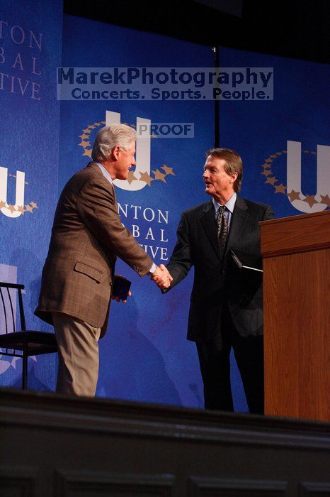 Former President Bill Clinton shakes hands with UT President William Powers Jr. after he spoke at the opening plenary session of the CGIU meeting.  Day one of the 2nd Annual Clinton Global Initiative University (CGIU) meeting was held at The University of Texas at Austin, Friday, February 13, 2009.

Filename: SRM_20090213_16354105.jpg
Aperture: f/4.0
Shutter Speed: 1/160
Body: Canon EOS-1D Mark II
Lens: Canon EF 80-200mm f/2.8 L