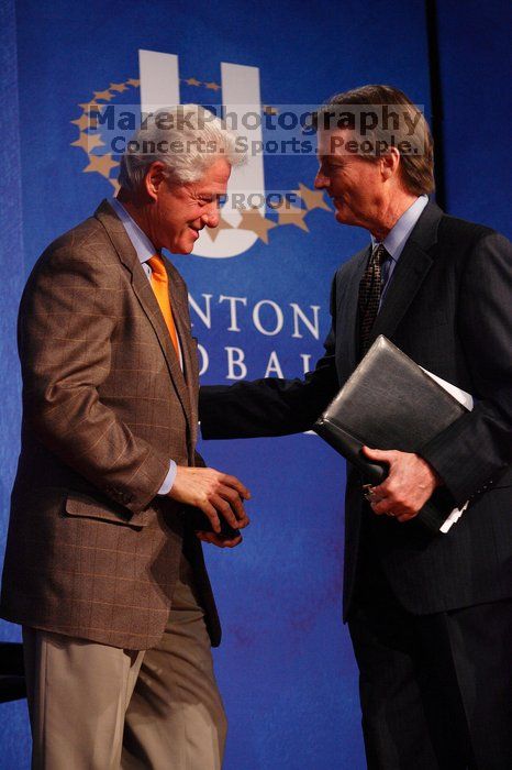 Former President Bill Clinton shakes hands with UT President William Powers Jr. after he spoke at the opening plenary session of the CGIU meeting.  Day one of the 2nd Annual Clinton Global Initiative University (CGIU) meeting was held at The University of Texas at Austin, Friday, February 13, 2009.

Filename: SRM_20090213_16354314.jpg
Aperture: f/4.0
Shutter Speed: 1/160
Body: Canon EOS-1D Mark II
Lens: Canon EF 80-200mm f/2.8 L