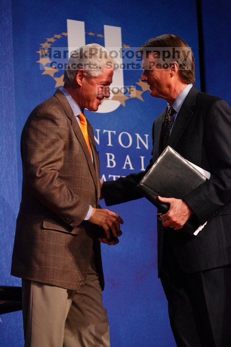 Former President Bill Clinton shakes hands with UT President William Powers Jr. after he spoke at the opening plenary session of the CGIU meeting.  Day one of the 2nd Annual Clinton Global Initiative University (CGIU) meeting was held at The University of Texas at Austin, Friday, February 13, 2009.

Filename: SRM_20090213_16354315.jpg
Aperture: f/4.0
Shutter Speed: 1/160
Body: Canon EOS-1D Mark II
Lens: Canon EF 80-200mm f/2.8 L