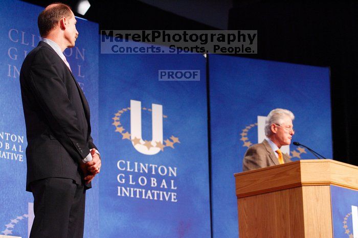 Former President Bill Clinton hands out commitment certificates to CGIU attendees for their exceptional pledges to the CGI cause during the opening plenary session of the CGIU meeting.  Day one of the 2nd Annual Clinton Global Initiative University (CGIU) meeting was held at The University of Texas at Austin, Friday, February 13, 2009.

Filename: SRM_20090213_16375123.jpg
Aperture: f/4.0
Shutter Speed: 1/100
Body: Canon EOS-1D Mark II
Lens: Canon EF 80-200mm f/2.8 L