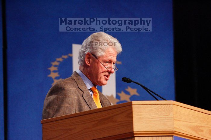 Former President Bill Clinton hands out commitment certificates to CGIU attendees for their exceptional pledges to the CGI cause during the opening plenary session of the CGIU meeting.  Day one of the 2nd Annual Clinton Global Initiative University (CGIU) meeting was held at The University of Texas at Austin, Friday, February 13, 2009.

Filename: SRM_20090213_16385629.jpg
Aperture: f/4.0
Shutter Speed: 1/160
Body: Canon EOS-1D Mark II
Lens: Canon EF 80-200mm f/2.8 L