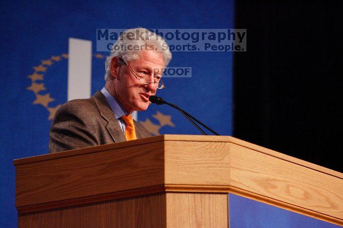 Former President Bill Clinton hands out commitment certificates to CGIU attendees for their exceptional pledges to the CGI cause during the opening plenary session of the CGIU meeting.  Day one of the 2nd Annual Clinton Global Initiative University (CGIU) meeting was held at The University of Texas at Austin, Friday, February 13, 2009.

Filename: SRM_20090213_16391831.jpg
Aperture: f/4.0
Shutter Speed: 1/200
Body: Canon EOS-1D Mark II
Lens: Canon EF 80-200mm f/2.8 L