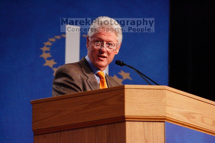 Former President Bill Clinton hands out commitment certificates to CGIU attendees for their exceptional pledges to the CGI cause during the opening plenary session of the CGIU meeting.  Day one of the 2nd Annual Clinton Global Initiative University (CGIU) meeting was held at The University of Texas at Austin, Friday, February 13, 2009.

Filename: SRM_20090213_16392533.jpg
Aperture: f/4.0
Shutter Speed: 1/200
Body: Canon EOS-1D Mark II
Lens: Canon EF 80-200mm f/2.8 L