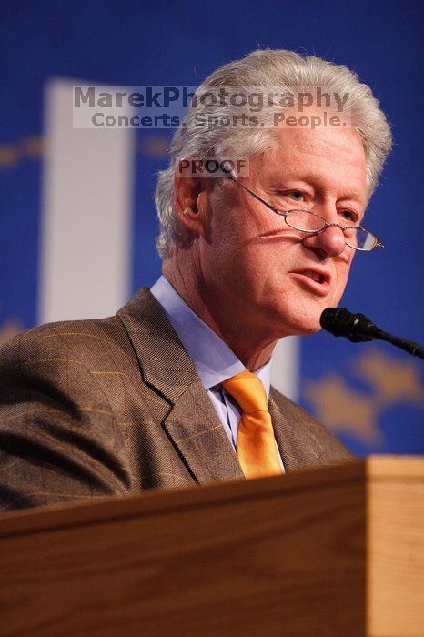 Former President Bill Clinton hands out commitment certificates to CGIU attendees for their exceptional pledges to the CGI cause during the opening plenary session of the CGIU meeting.  Day one of the 2nd Annual Clinton Global Initiative University (CGIU) meeting was held at The University of Texas at Austin, Friday, February 13, 2009.

Filename: SRM_20090213_16394785.jpg
Aperture: f/2.8
Shutter Speed: 1/250
Body: Canon EOS 20D
Lens: Canon EF 300mm f/2.8 L IS