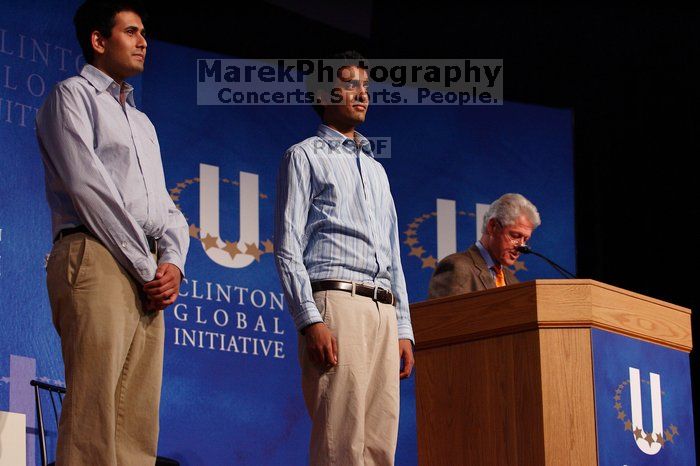 Former President Bill Clinton hands out commitment certificates to CGIU attendees for their exceptional pledges to the CGI cause during the opening plenary session of the CGIU meeting.  Day one of the 2nd Annual Clinton Global Initiative University (CGIU) meeting was held at The University of Texas at Austin, Friday, February 13, 2009.

Filename: SRM_20090213_16410553.jpg
Aperture: f/4.0
Shutter Speed: 1/200
Body: Canon EOS-1D Mark II
Lens: Canon EF 80-200mm f/2.8 L