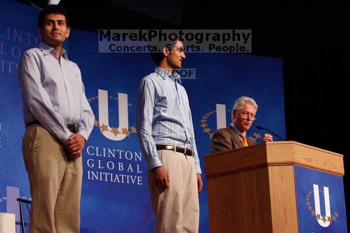 Former President Bill Clinton hands out commitment certificates to CGIU attendees for their exceptional pledges to the CGI cause during the opening plenary session of the CGIU meeting.  Day one of the 2nd Annual Clinton Global Initiative University (CGIU) meeting was held at The University of Texas at Austin, Friday, February 13, 2009.

Filename: SRM_20090213_16420965.jpg
Aperture: f/4.0
Shutter Speed: 1/160
Body: Canon EOS-1D Mark II
Lens: Canon EF 80-200mm f/2.8 L